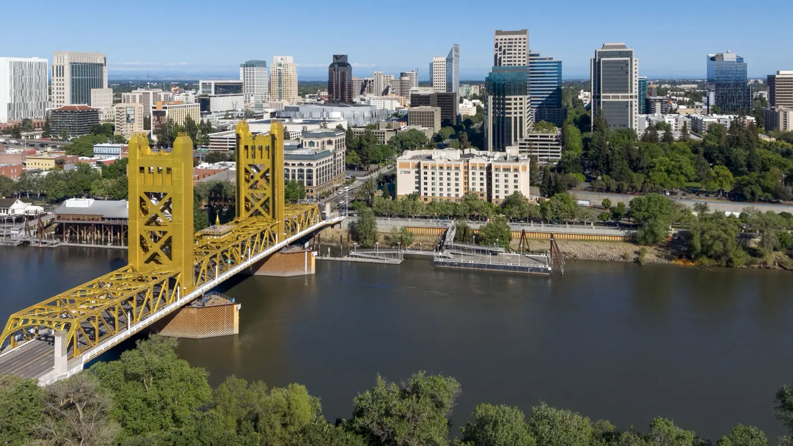 The Sacramento skyline across the river, the yellow Tower Bridge in the foreground